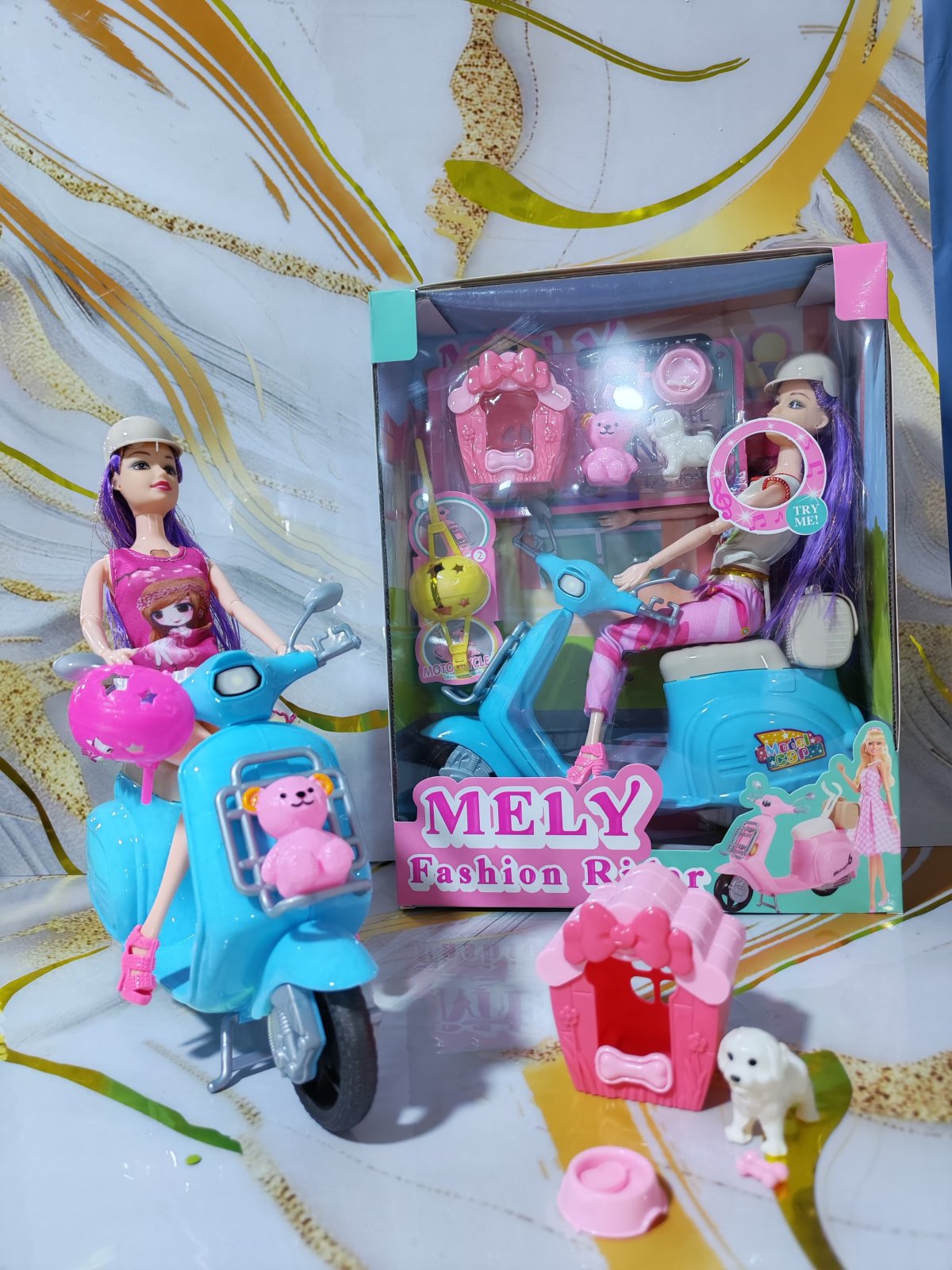 MUÑECA MELY EN MOTOCICLETA CON ACCESORIOS