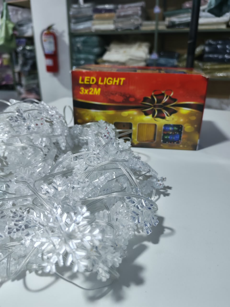 LUCES CORTINA con diseño COPOS DE NIEVE AMBAR 3*2
